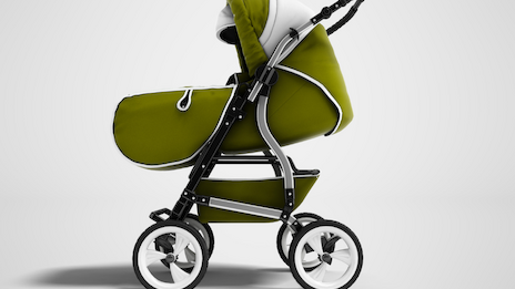 A green baby stroller with white wheels and a black frame, seen from the side.
